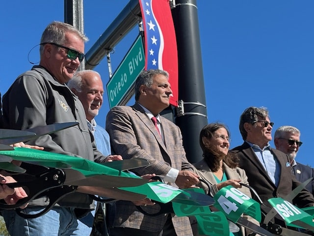 Oviedo and Seminole County officials cut the ribbon celebrating completion of phase 2 of the S.R. 426/C.R. 419 road expansion project.